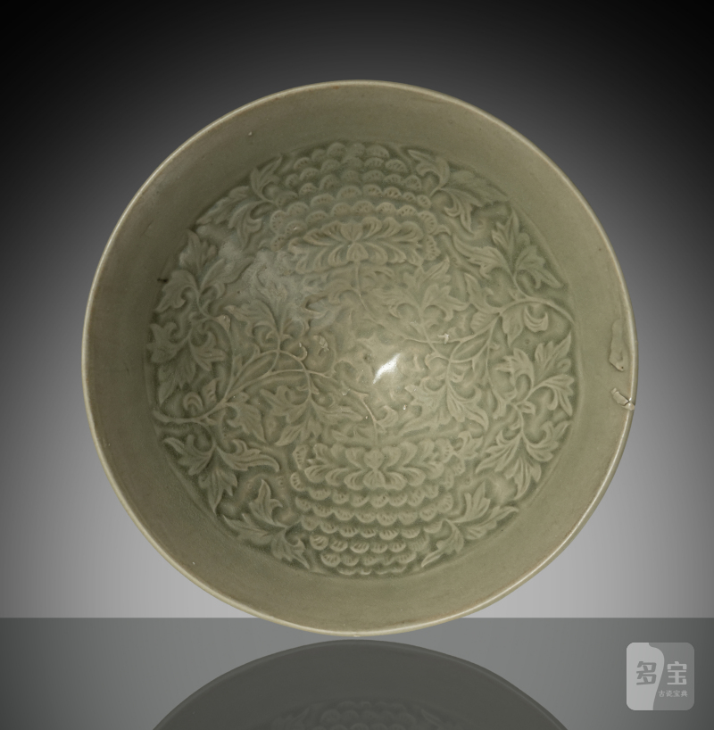 A fine conical 'Yaozhou' ware bowl with carved floral decoration